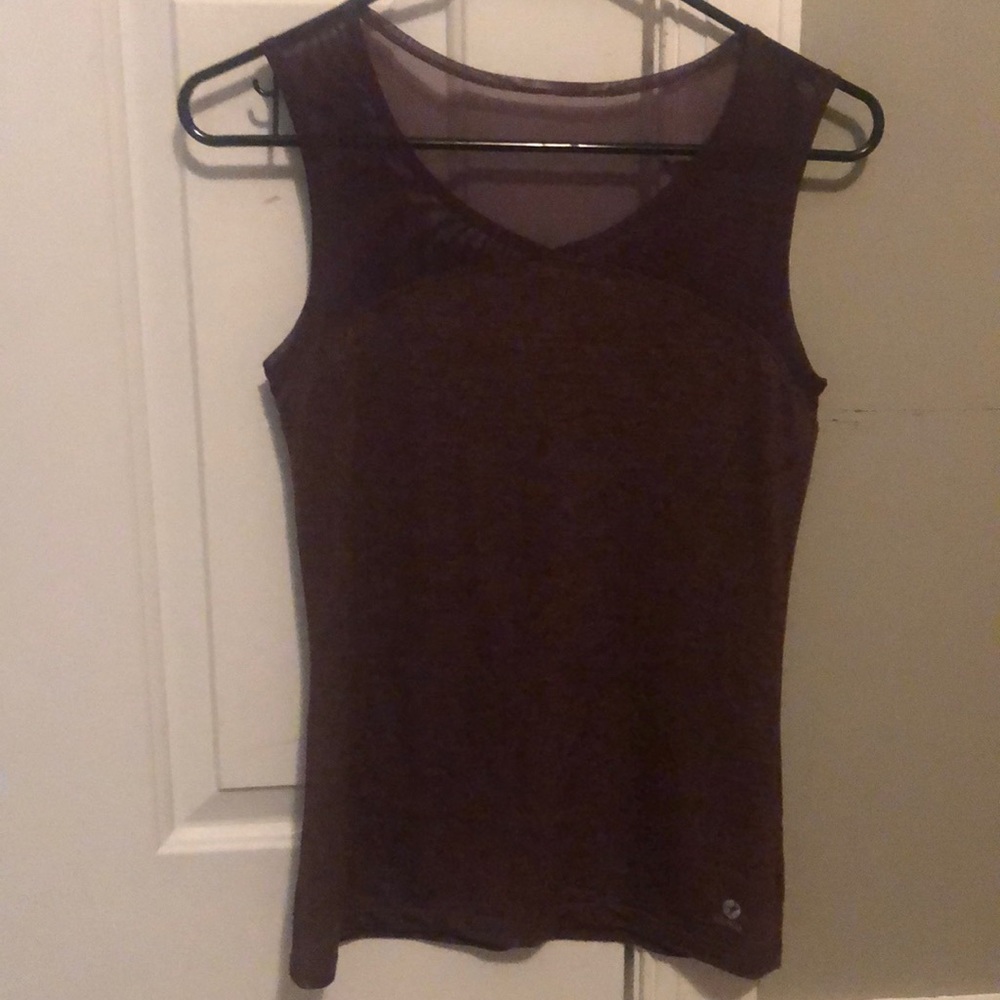 Cute Oiselle tank with mesh top. Never worn.